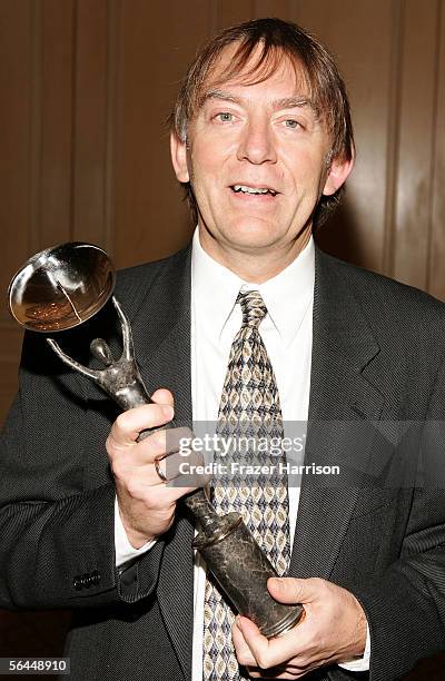 Sound Mixer Andy Nelson, with his award for 'Star Wars' attends the "10th Annual Satellite Awards" at the Four Seasons Hotel December 17, 2005 in...