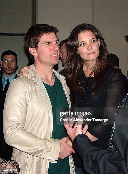 Actors Tom Cruise and Katie Holmes are seen backstage at the at the Y100.7 Jingle Ball on December 17, 2005 in Sunrise, Florida.