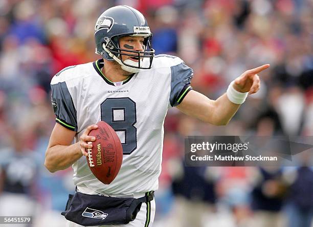 Quarterback Matt Hasselbeck of the Seattle Seahawks scrambles out of the pocket against the Tennessee Titans December 18, 2005 at The Coliseum in...