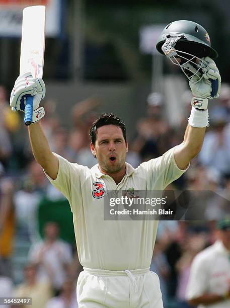 Brad Hodge of Australia celebrates his double century during day four of the First Test between Australia and South Africa played at the WACA on...