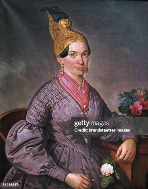 Portrait of a woman who wears a golden bonnet: portrait of Juliane Weinmeister. Oil on Canvas, around 1845. [Die Goldhaube. Krone der...