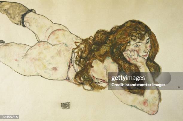 Nude on her stomach by Egon Schiele. D1951. 1917. [Am Bauch liegender weiblicher Akt von Egon Schiele. D1951. 1917.]