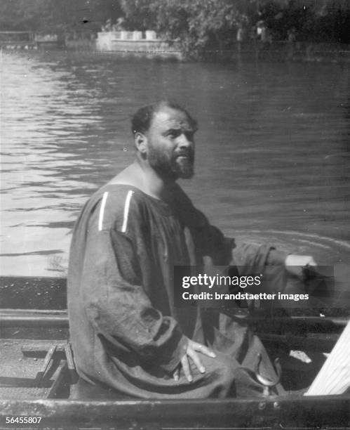 Gustav Klimt in a rowboat at the Attersee. Photography. Around 1910. [Gustav Klimt im Ruderboot auf dem Attersee. Um 1910. Photographie...