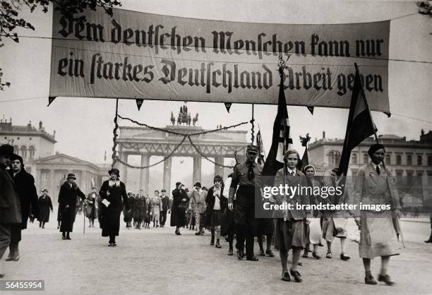National socialist demonstration in Berlin in front of the Brandenburger Gate : Only a strong Germany can provide employment to its peole ....