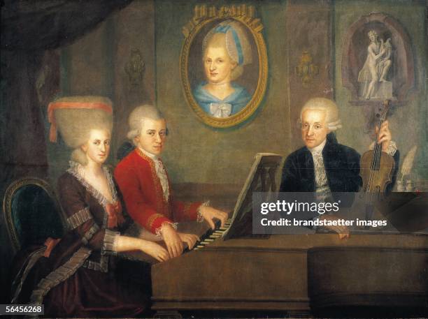 Leopold Mozart with his children Wolfgang and Nannerl at the piano, the portrait of their deceased mother on the wall. Oil on Canvas by Johann...
