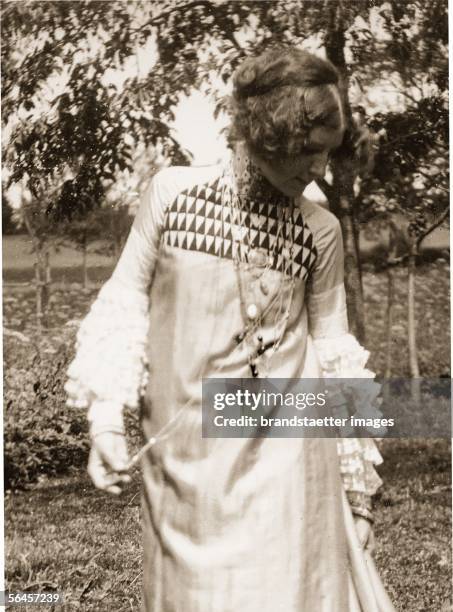 Emilie Floege in summer dress designed by Gustav Klimt. She is wearing a collier by Kolo Moser, which Klimt had donated to her in 1903. Dress from...