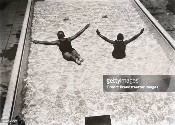 American high divers Dorothy Pounyton and Bessie Kucera. American championships at the Athletic Club of Pasadena, California. Photography, about...