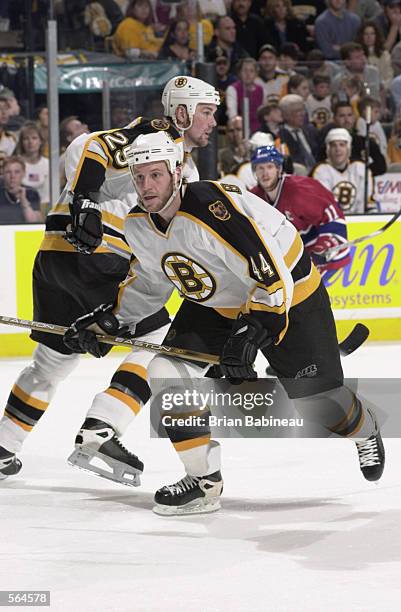 Defenseman Nick Boynton of the Boston Bruins chases down the puck against the Montreal Canadiens during game 5 of the Stanley Cup play-offs at the...