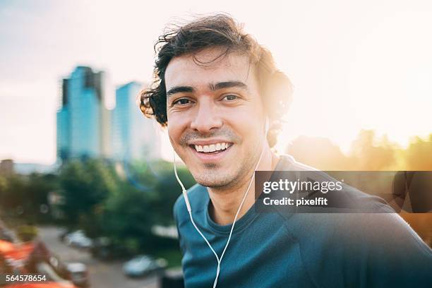 close up of a sportsman with headphones - walkman closeup stock pictures, royalty-free photos & images