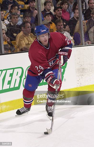Right wing Andreas Dackell of the Montreal Canadiens carries the puck against the Boston Bruins during game 5 of the Stanley Cup play-offs at the...