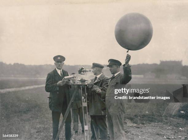 Proof of wind direction on an airfield bevor the virgin flight of the airship L.Z. 127 on 19th of september 1928, germany. Photography. [Pruefung des...