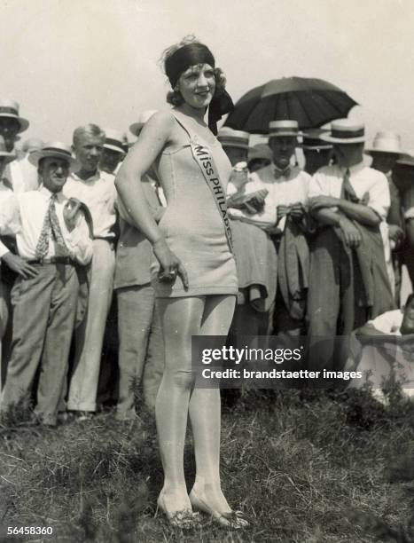 Miss Philadelphia in bathing suit and stockings at the international beauty contest in Galveston, Texas. Photography. Around 1930. ["Miss...