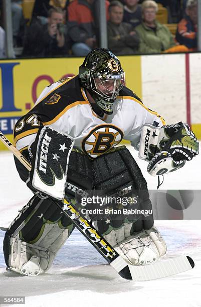 Goaltender Byron Dafoe of the Boston Bruins in goal against the Montreal Canadiens during game 5 of the Stanley Cup play-offs at the Fleet Center in...