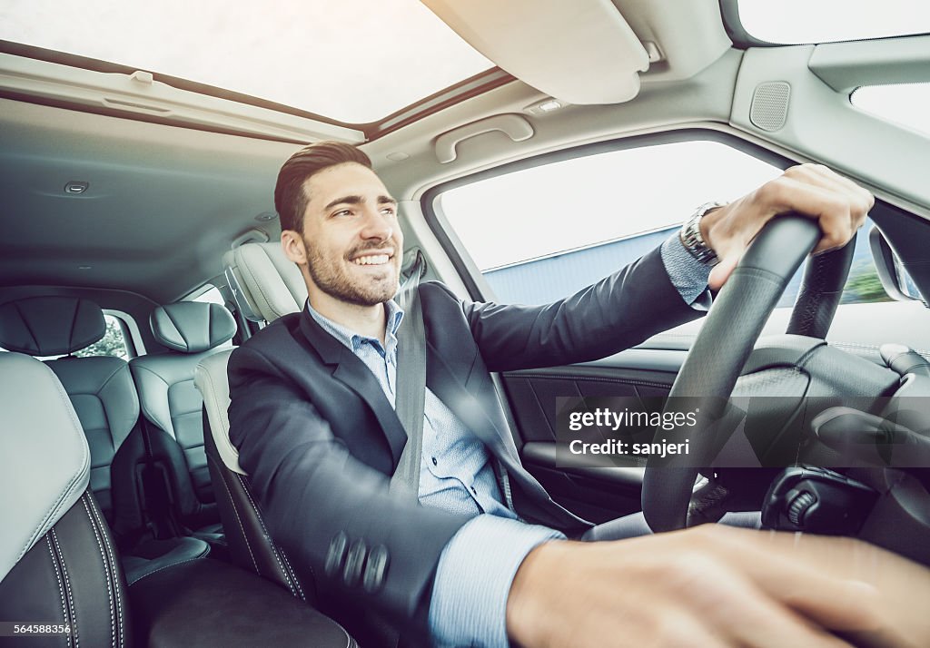 Business Man Driving the Car