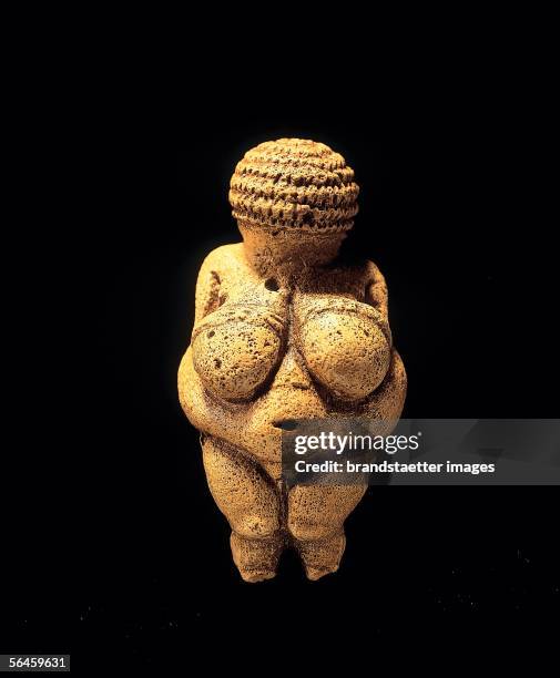 Venus of Willendorf, statuette made of limestone, made about 25.000 BC. Photography by Gerhard Trumler, 1990. [Venus von Willendorf, Statuette aus...