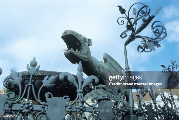 The Lindwurm Fountain in Klagenfurt, Carinthia. Built bewtween 1582 and 1590. Photography. [Der Lindwurm-Brunnen auf dem Neuen Platz in Klagenfurt,...