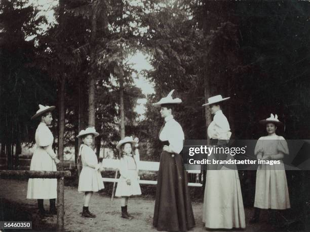 Sophie of Hohenberg, wife of archduke heir apparant Francis Ferdinand d'Este, with her children in the park. Photography, 1910. [Sophie von...