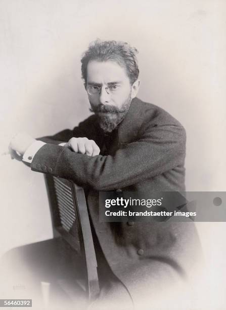 Self-Portrait Hermann Drawe, backwards on the chair- with cigarette in one hand. Dry stamp Drawe. Vienna. Photography. 1905. [Hermann Drawe....