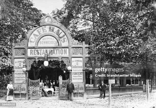 Vienna: Coffee House in Prater. Cafe- Restaurant by Rudolf Schneider. Entrance with the view on chestnut wood Guest garden. Photography. Around 1900....