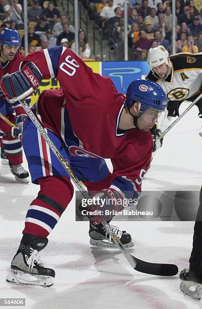 Center Joe Juneau of the Montreal Canadiens gets set to take a face off against the Boston Bruins during game 5 of the Stanley Cup play-offs at the...