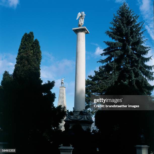 Column of victory in the palace garden of Kleinwetzdorf. In the back: obelisk above the tomb of field marshal Radetzky. Photography. 2000....