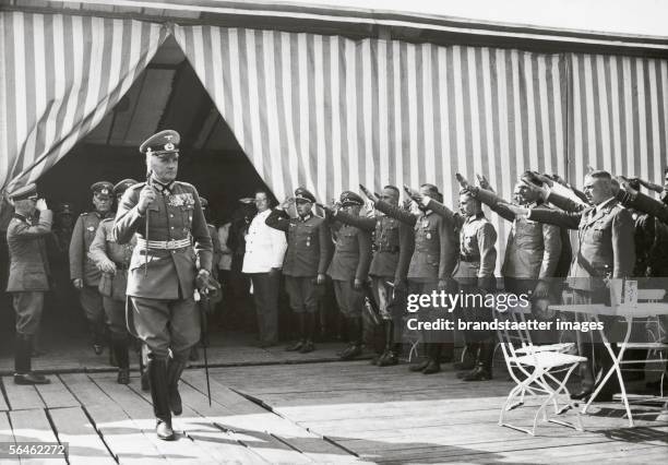 Field marshal Werner Blomberg is inspecting a storage of the German Armed Forces in Nuremberg. Germany. Photography. 8.9.1937. [Generalfeldmarschall...