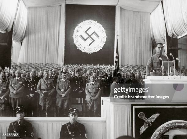 Rudolf Hess inaugurates in the presence of Adolf Hitler, Heinrich Himmler and head of Nazi district Julius Streicher the "Reichsparteitag" of work....