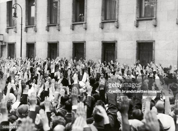 Day of the referendum: A crowd cheers for Adolf Hitler in front of the Chancellery of the Reich. Berlin. Germany. Photography. 19.8.1934. [Tag der...
