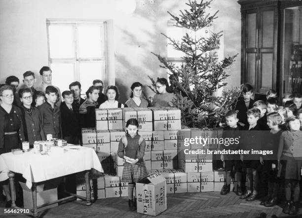 Hand-over of care-parcels at home for the blind. Austria. Photography, 1948. [Care-Paket uebergabe im Blindeninstitut 19. Hofzeile 15. Oesterreich....