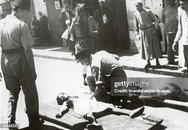 Child who was killed by a bomb attack in palestine. Photography. 1938. [Dieses Kind wurde bei einem arabischen Bombenanschlag in Palaestina getoetet....