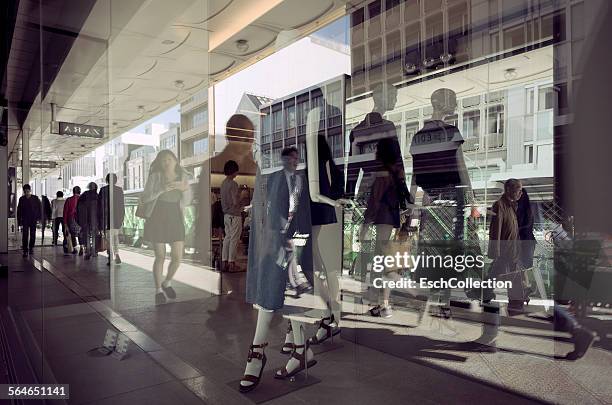 shop window with reflection of people, kyoto - shopping abstract stockfoto's en -beelden