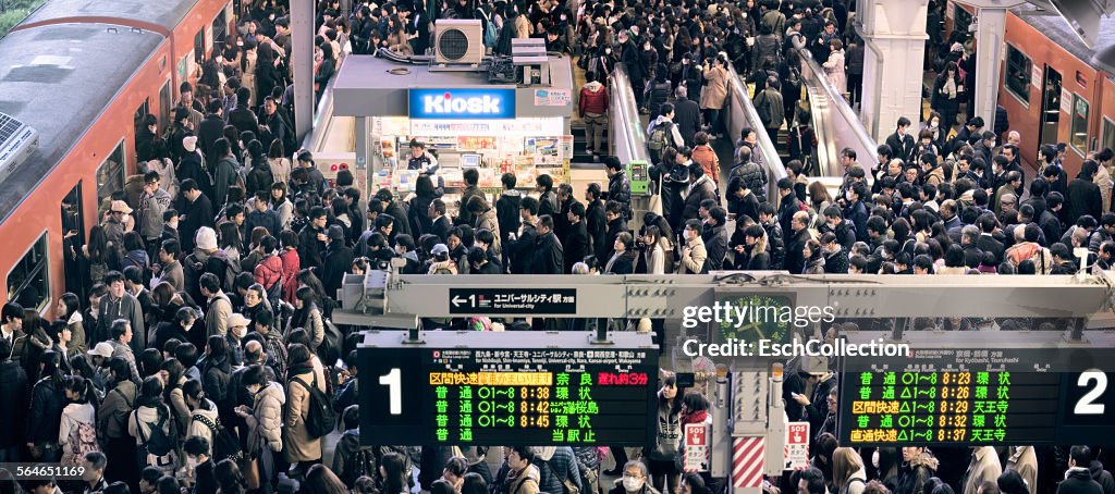 Busy morning commute at Osaka Station, Japan