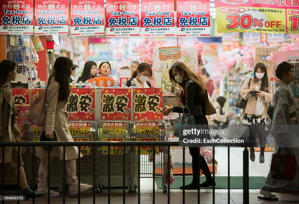 People shopping at a drugstore in Kyoto, Japan