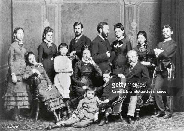 Freud Family. Photography. Around 1876. Standing , Paula, Anna, unknown girl, Sigmund, Emanuel , Rosa, Maria or 'Mitzi', Simon Nathanson ; seated:...