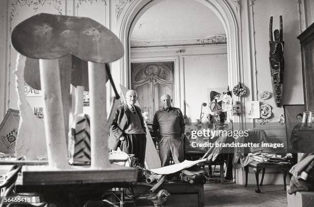 Pablo Picasso with his arts dealer Daniel-Henry Kahnweiler in Picasso's Villa La Californie near Cannes. France. Photography. 1957. [Pablo Picasso...