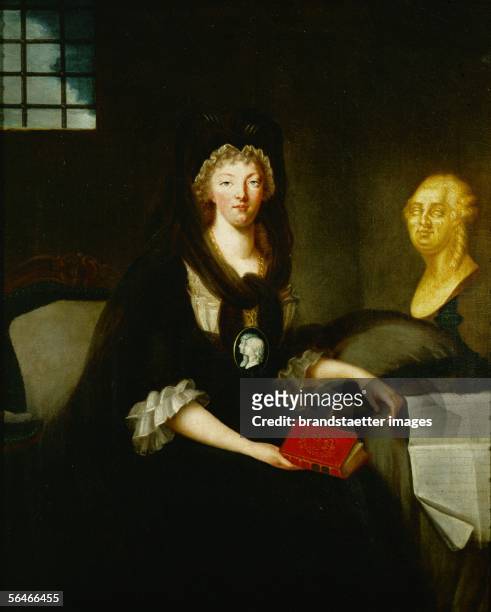 Queen Marie Antoinette imprisoned in the Conciergerie. The Queen, in deep mourning for her husband, wears a medallion with the portraits of her two...