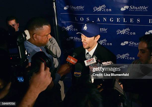 Nomar Garciaparra of the Los Angeles Dodgers addresses the media at a press conference announcing his signing with the team on December 19, 2005 at...