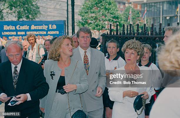English football player Geoff Hurst with his wife, Judith at a memorial service for English footballer Bobby Moore at Westminster Abbey, London, 28th...
