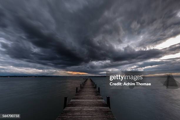 stormy lake - storm fotografías e imágenes de stock