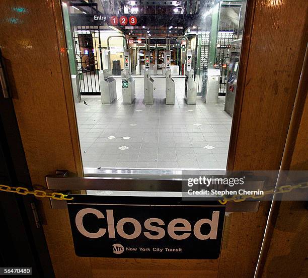 Yellow chain with a closed sign appears across the doors of the 72nd street subway station on December 20, 2005 in New York City. Earlier, Roger...