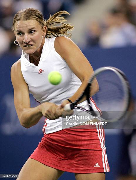 File photo taken 01 September 2005 shows Bulgaria's Sesil Karatantcheva returning to number three seeded Amelie Mauresmo of France at the US Open in...