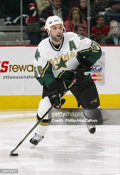Sergei Zubov of the Dallas Stars looks to make a pass play against the Ottawa Senators during their NHL game on December15, 2005 at the Corel Centre...