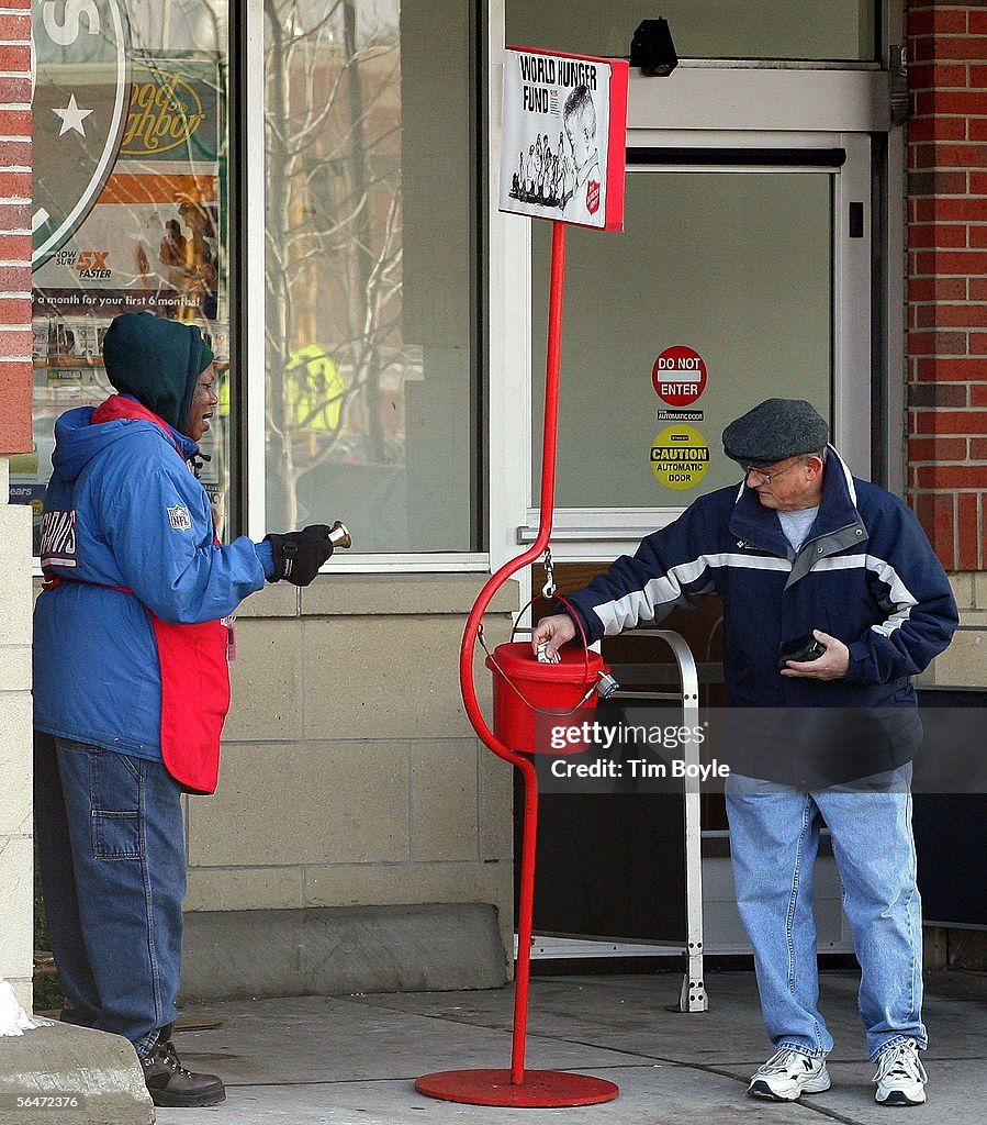 Salvation Army Bell Ringers Collect Funds For Charity