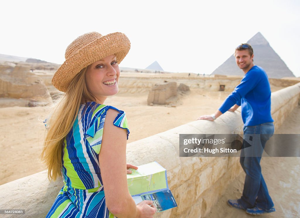 Tourist Couple Visiting the Pyramids of Giza