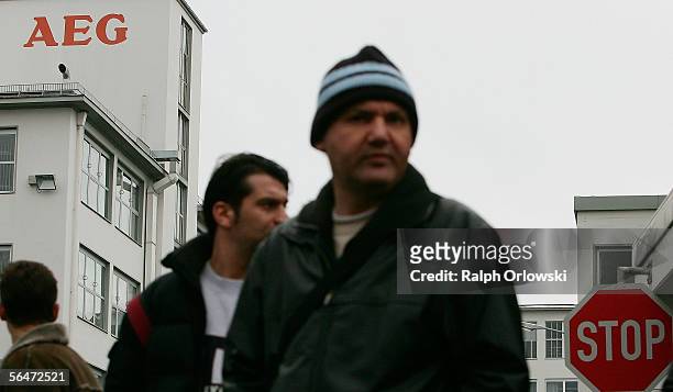 Employees of German manufacturer of household appliances AEG leave their manufacturing plant to join a works meeting on December 20, 2005 in...