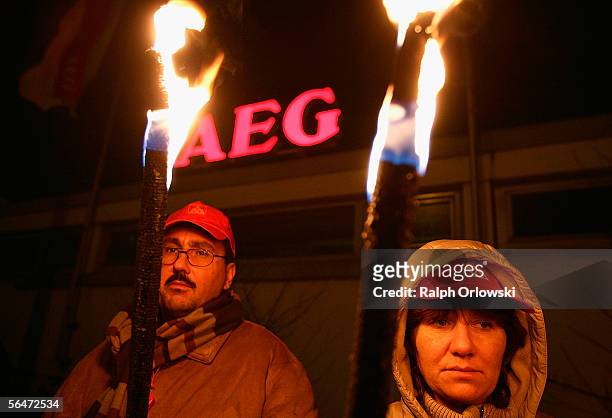 Employees of the German manufacturer for home appliances AEG demonstrate against the planned closure of factory plant on December 20, 2005 in...