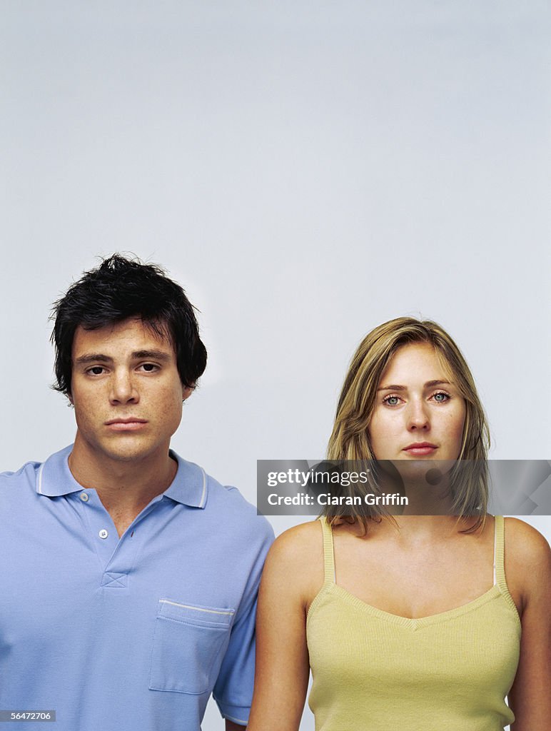 Portrait of young couple standing together