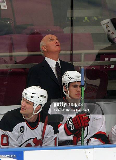 Lou Lamoriello debuts as coach of of the New Jersey Devils as they play against the New York Rangers at Madison Square Garden on December 20, 2005 in...