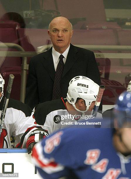 Lou Lamoriello debuts as coach of of the New Jersey Devils as they play against the New York Rangers on December 20, 2005 at Madison Square Garden in...