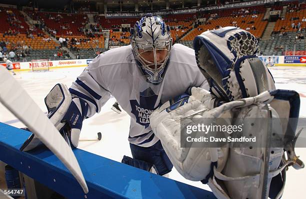 Goaltender Corey Schwab of the Toronto Maple Leafs stretches prior to the start of the game against the New York Islanders at Air Canada Centre in...